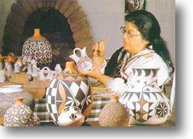 Woman of Tigua Community painting pottery 